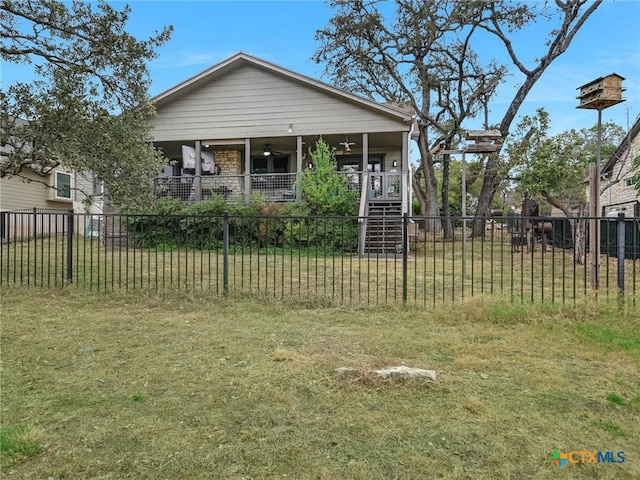 bungalow featuring ceiling fan, a front yard, and covered porch