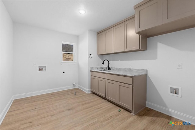 126 Overlook Trl, Copperas Cove, TX 76522 - clothes washing area with hookup for a washing machine, electric dryer hookup, baseboards, and light wood-style floors
