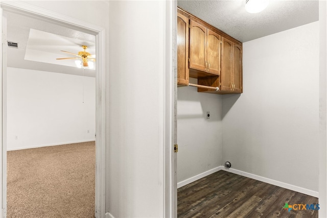 laundry room featuring baseboards, visible vents, cabinet space, ceiling fan, and electric dryer hookup