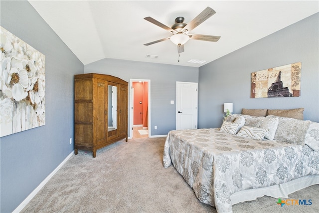 bedroom with visible vents, vaulted ceiling, baseboards, and light colored carpet