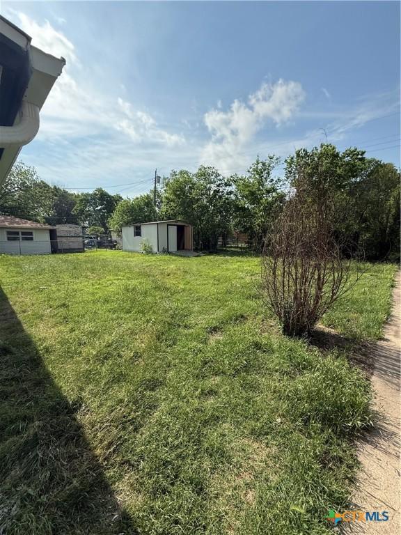 2310 Terrace Dr, Killeen, TX 76543 - view of yard with an outdoor structure