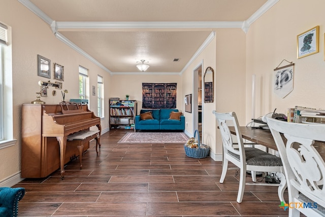 interior space with ornamental molding and dark hardwood / wood-style floors