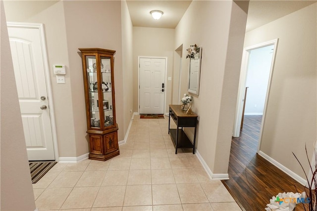 hall with light wood-type flooring