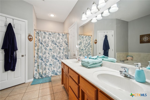 bathroom with vanity, tile patterned floors, and a shower with shower curtain