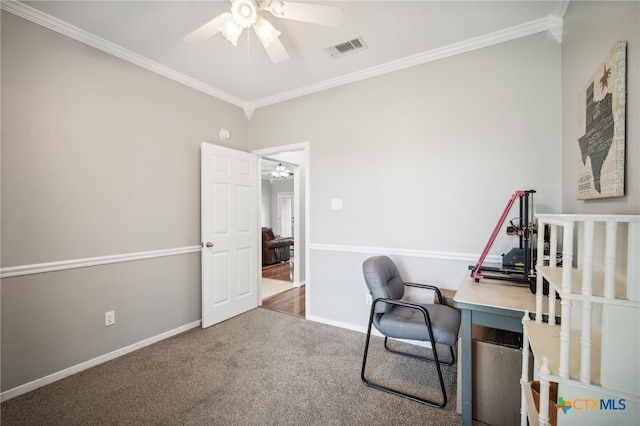 office area with ornamental molding, carpet, and ceiling fan