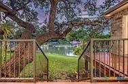 1002 Merry Ln, Kingsland, TX 78639 - view of yard with a deck with water view