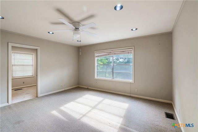 701 Live Oak St, Gatesville, TX 76528 - unfurnished room with baseboards, carpet, ceiling fan, recessed lighting, and ornamental molding