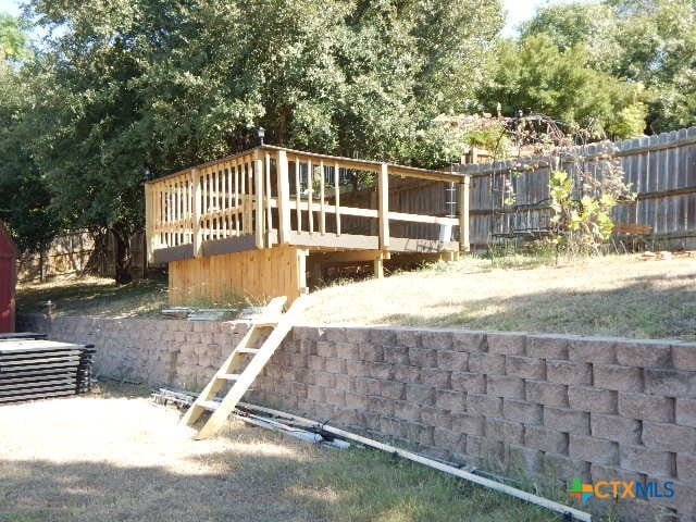 view of yard with a deck