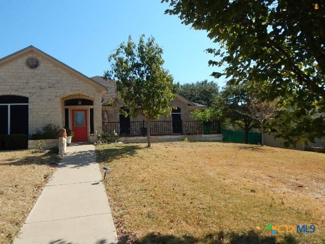 view of front of home with a front yard