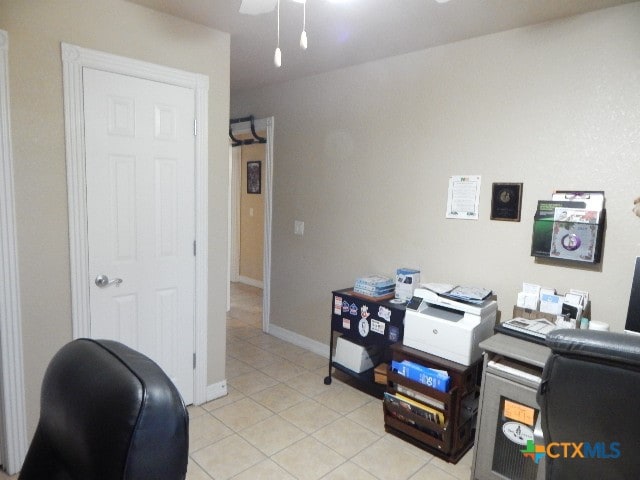 tiled office with ceiling fan