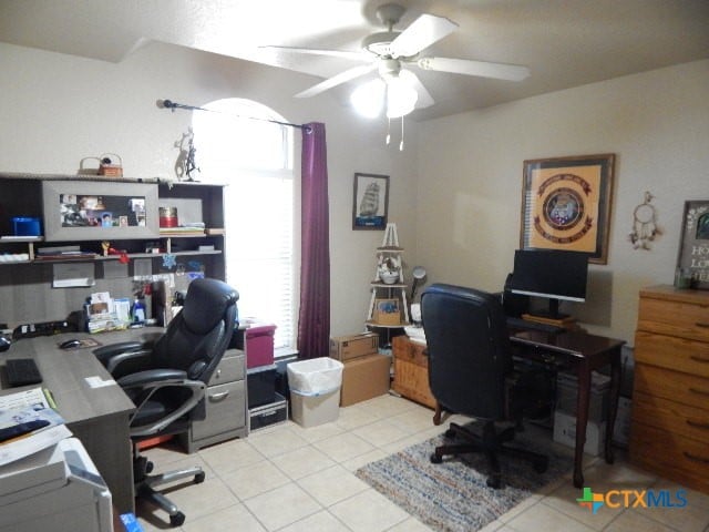 office area with ceiling fan and light tile patterned floors