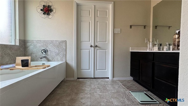 9516 Glynhill Ct, Killeen, TX 76542 - bathroom with a closet, a bath, tile patterned flooring, and vanity