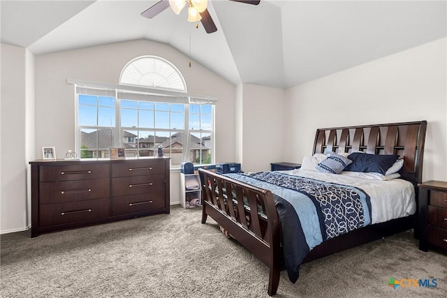 bedroom featuring a ceiling fan, carpet, and vaulted ceiling