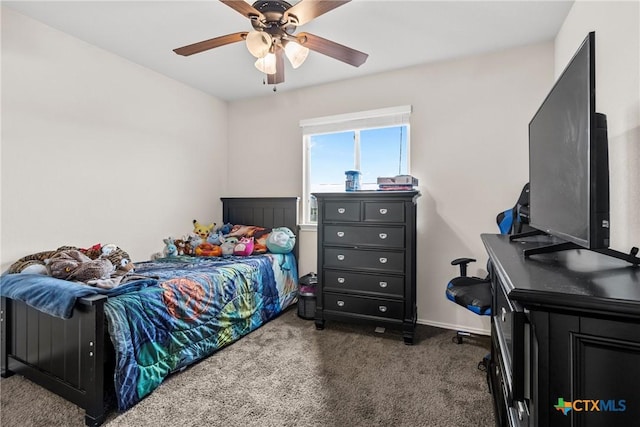 bedroom with ceiling fan, carpet floors, and baseboards