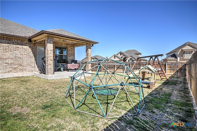 view of yard featuring a patio and a fenced backyard