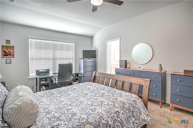 bedroom featuring lofted ceiling, ceiling fan, and carpet flooring