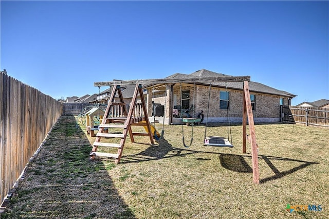 view of jungle gym featuring a fenced backyard and a yard