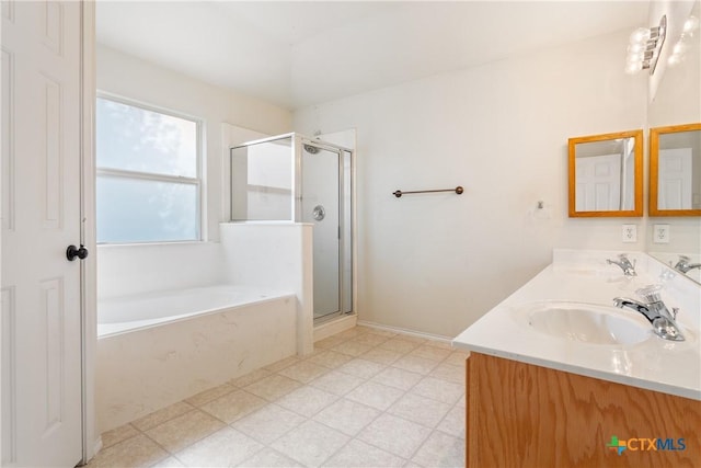 bathroom with separate shower and tub and vanity