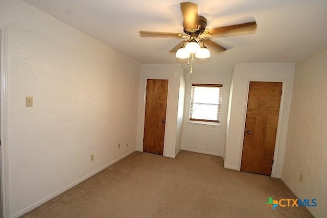 1306 Dryden Ave, Copperas Cove, TX 76522 - unfurnished bedroom with light colored carpet and a ceiling fan