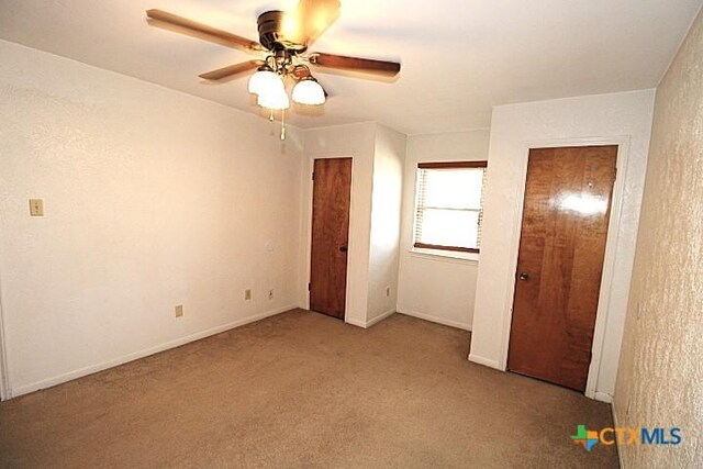 1306 Dryden Ave, Copperas Cove, TX 76522 - unfurnished bedroom with carpet floors and ceiling fan