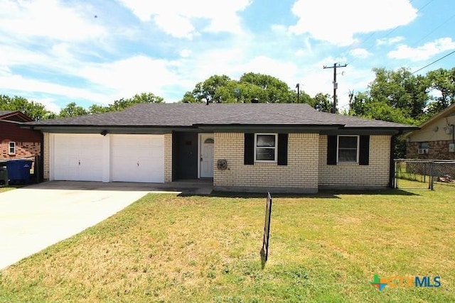 1306 Dryden Ave, Copperas Cove, TX 76522 - single story home featuring a garage, brick siding, and driveway