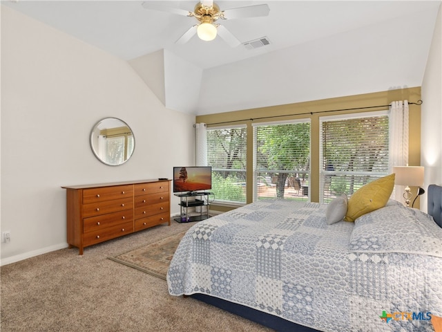 carpeted bedroom with ceiling fan and lofted ceiling