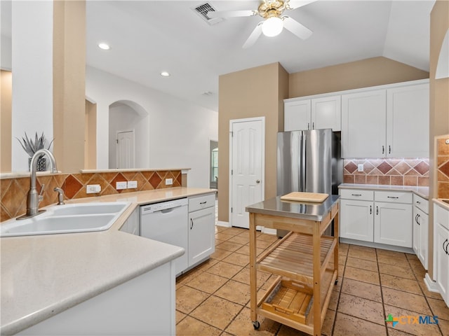 kitchen featuring white cabinetry, sink, and dishwasher