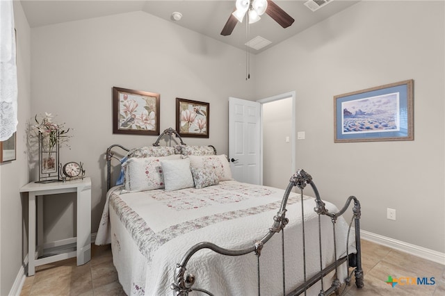 2935 Angelina Dr, Round Rock, TX 78665 - bedroom with lofted ceiling, baseboards, a ceiling fan, and light tile patterned flooring