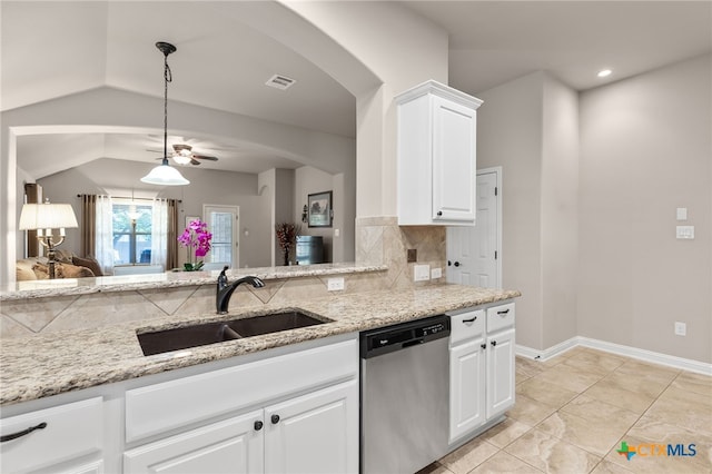 2935 Angelina Dr, Round Rock, TX 78665 - kitchen with dishwasher, a sink, light stone countertops, white cabinets, and decorative light fixtures