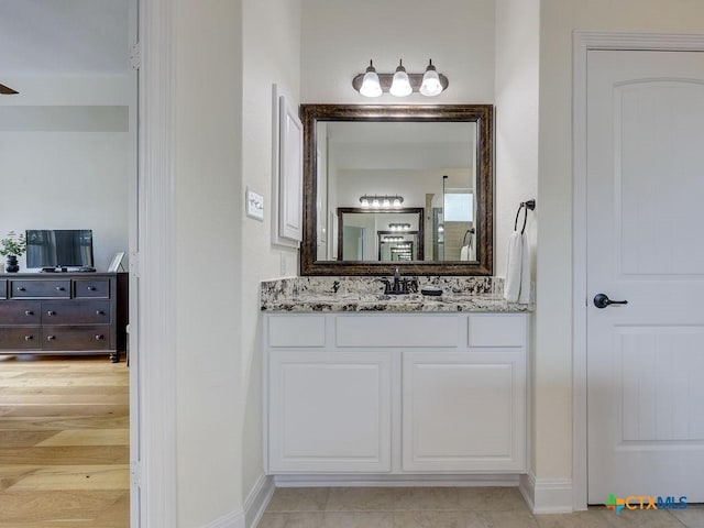 599 Mission Hill Run, New Braunfels, TX 78132 - full bath featuring vanity and baseboards