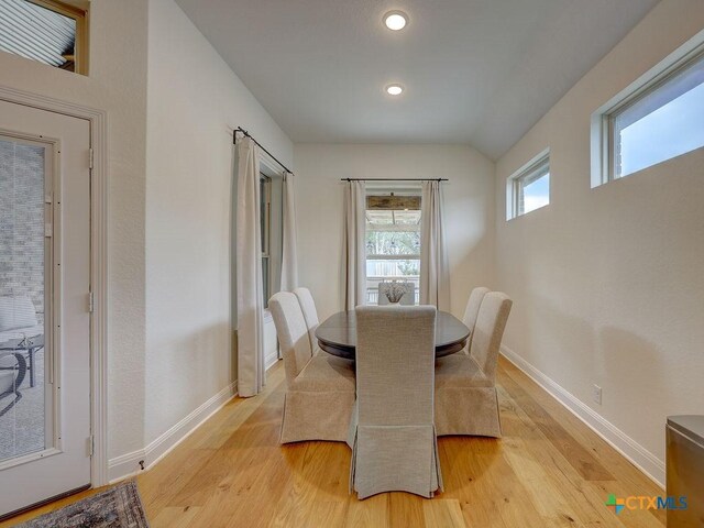 599 Mission Hill Run, New Braunfels, TX 78132 - dining space featuring light wood-type flooring, baseboards, recessed lighting, and lofted ceiling