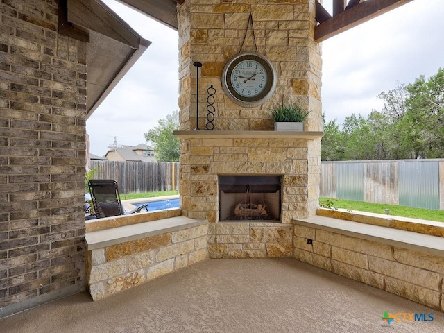 599 Mission Hill Run, New Braunfels, TX 78132 - view of patio with an outdoor stone fireplace