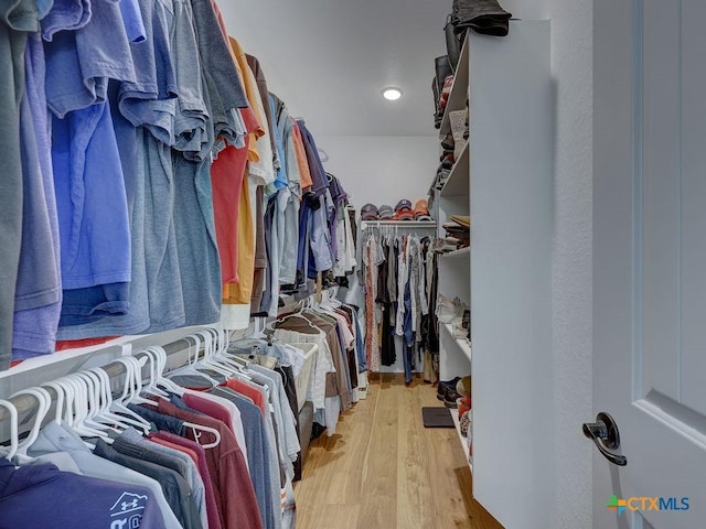 599 Mission Hill Run, New Braunfels, TX 78132 - walk in closet with wood finished floors