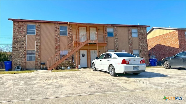 view of property with stairs