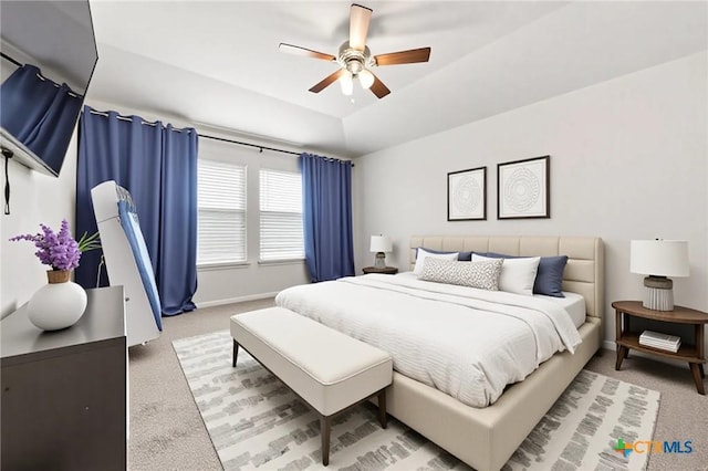 8903 Cantera Ridge Rd, Temple, TX 76502 - bedroom featuring light colored carpet, a tray ceiling, and a ceiling fan