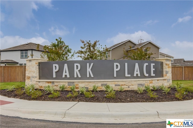 view of community sign