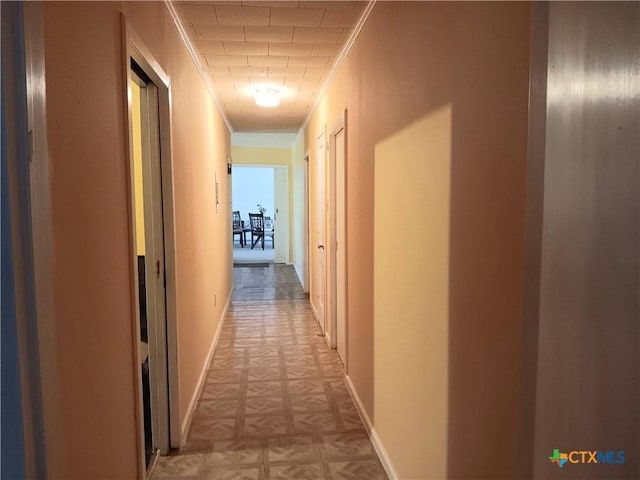 hallway with ornamental molding