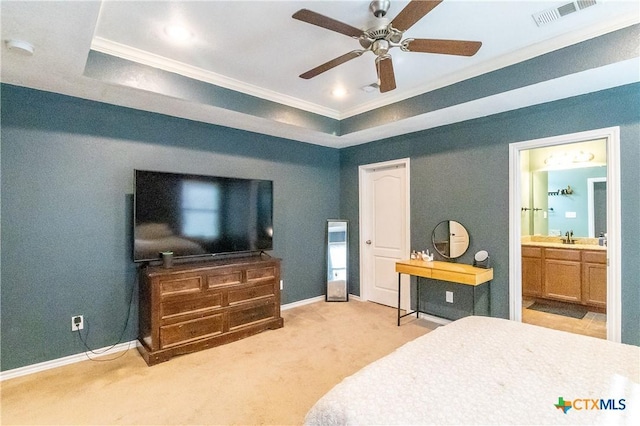 2529 Nolan Creek St, Temple, TX 76504 - carpeted bedroom featuring crown molding, a tray ceiling, connected bathroom, and ceiling fan