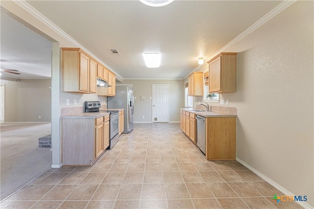 kitchen featuring visible vents, light countertops, under cabinet range hood, a sink, and stainless steel appliances