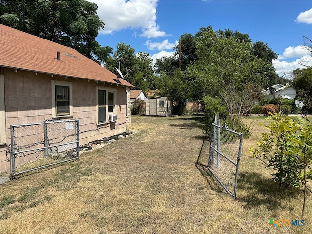 view of yard with a storage shed