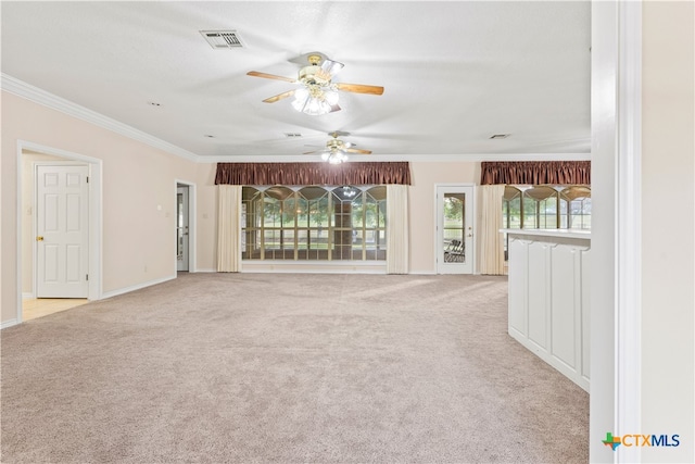 unfurnished living room with light colored carpet, ceiling fan, and ornamental molding