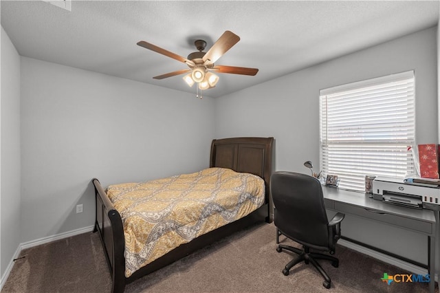bedroom featuring carpet floors, ceiling fan, and baseboards