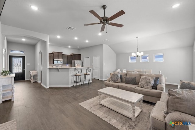 living area featuring recessed lighting, visible vents, ceiling fan with notable chandelier, and baseboards