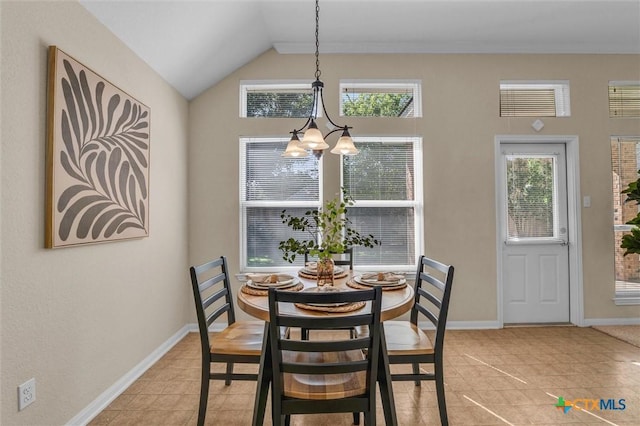 5708 High Meadow Dr, Temple, TX 76502 - dining area with a chandelier, light tile patterned floors, and vaulted ceiling