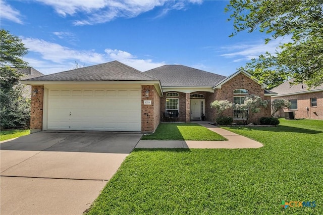 5708 High Meadow Dr, Temple, TX 76502 - view of front facade with brick siding, a front lawn, a garage, concrete driveway, and roof with shingles
