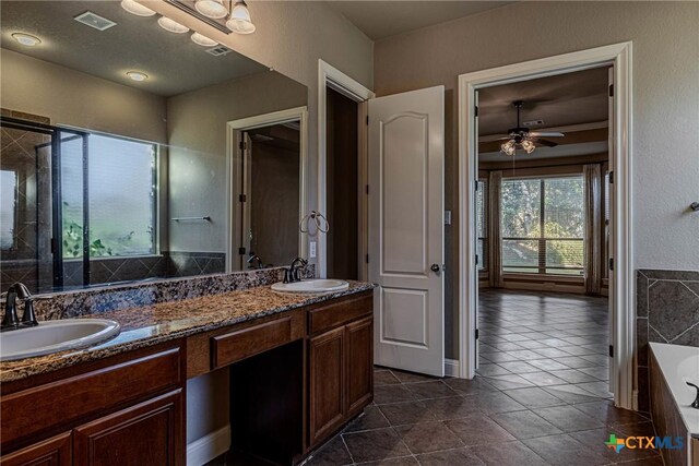 bathroom with separate shower and tub, ceiling fan, tile patterned flooring, and vanity