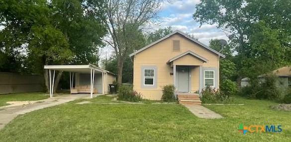 1309 S 4th St, Temple, TX 76504 - bungalow-style home featuring concrete driveway and a front lawn