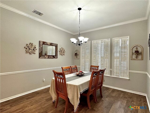 dining space with a chandelier, dark hardwood / wood-style floors, and crown molding