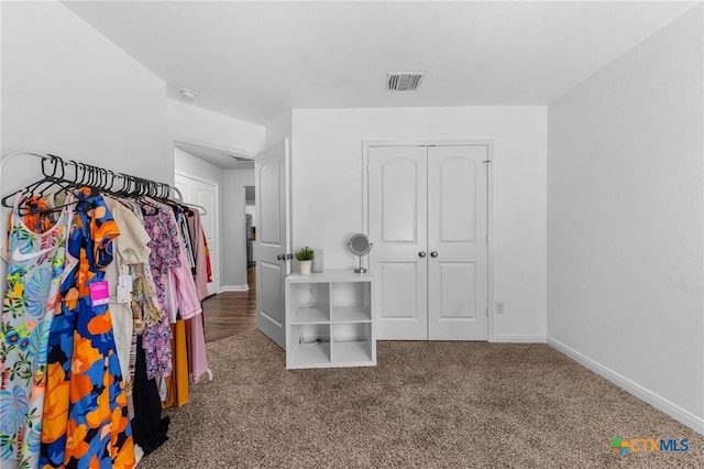 spacious closet featuring carpet