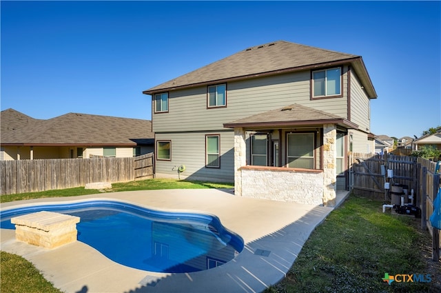 view of pool featuring a patio